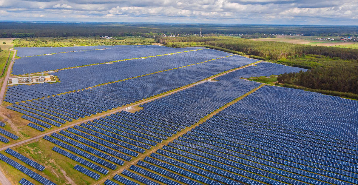 Aerial view of a large-scale floating solar plant on an industrial reservoir